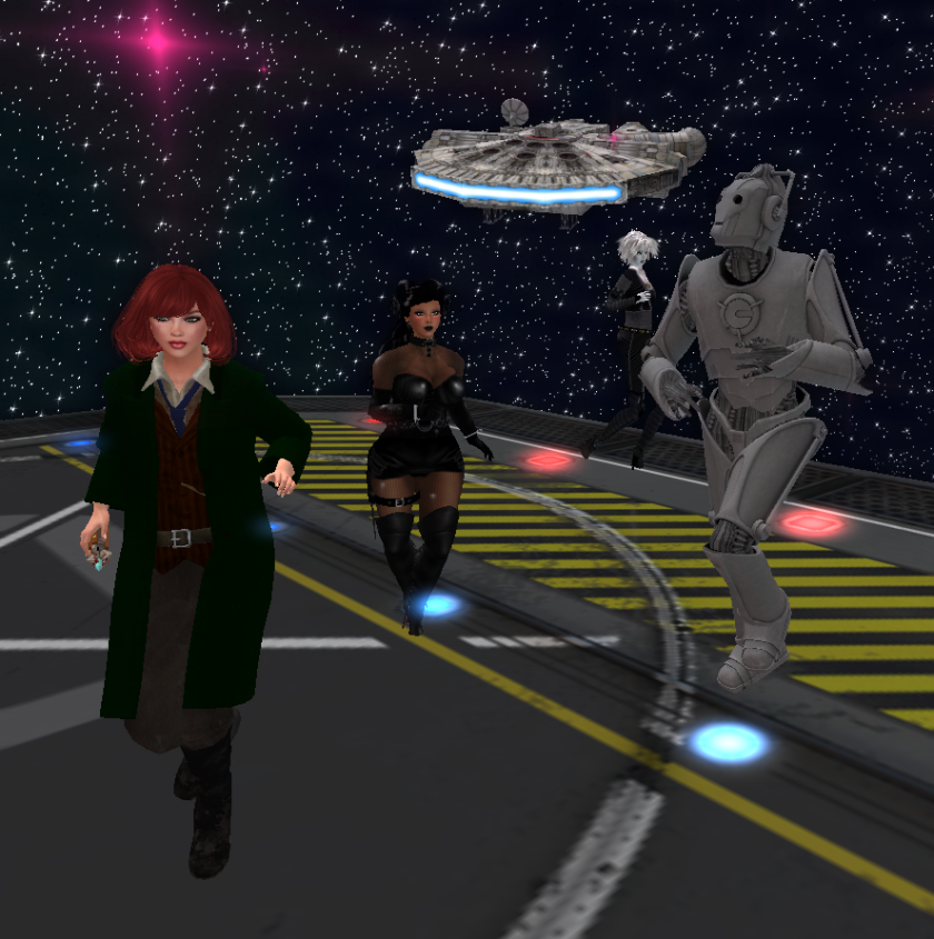 And this was taken just this past weekend: Me as The Eighth Doctor, my sister/cousin Dee Pudding (she'll kill me for that silly name) as Some Hawt Space Chicky, and the wonderful Aiden as a Cyberman, all dancing at a birthday party inworld. 