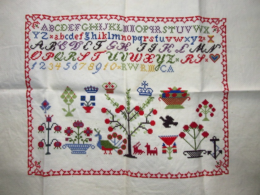 My first completed sampler, circa 1994. Please excuse the awful creases!